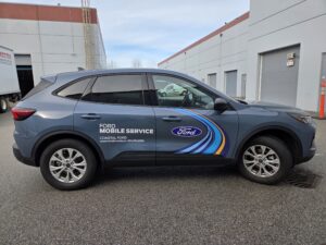 Custom vehicle graphics Burnaby installed on a Coastal Ford mobile service vehicle.