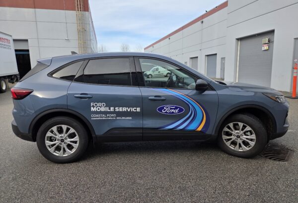 Custom vehicle graphics Burnaby installed on a Coastal Ford mobile service vehicle.
