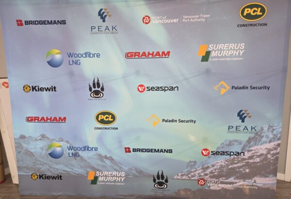 Tension fabric media walls Vancouver displaying sponsor logos for a local corporate event.