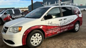 Van outside business on street