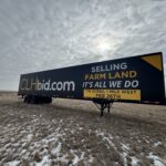 Large outdoor sign billboard in Southern Alberta near Medicine Hat