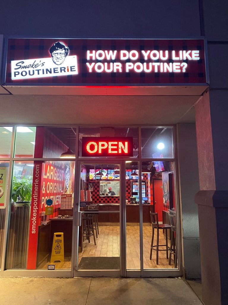 Storefront Sign lit at night - SpeedPro Canada