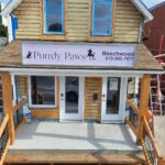 Purrdy Paws Beechwood storefront sign mounted above the entrance in Ottawa