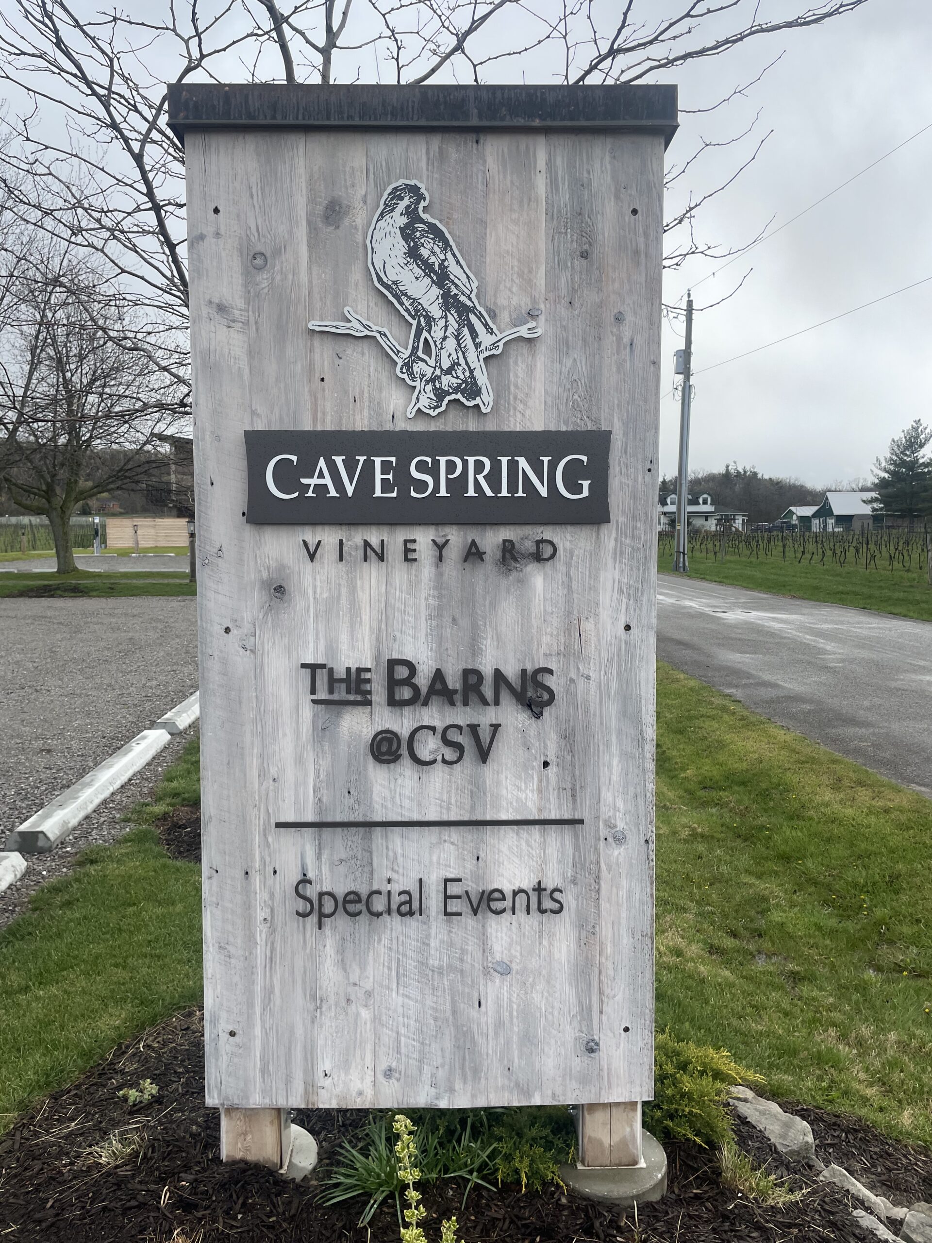Monument sign for Cave Spring Winery in Lincoln, ON.