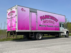 Moving Truck Wrapped In Pink Branding